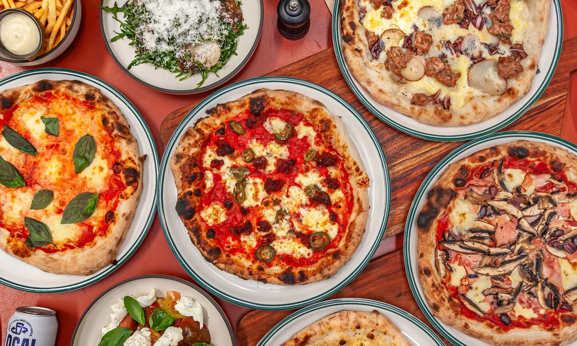 Enjoy a pizza and pint with sides for Two or Four at Local Brewing Co