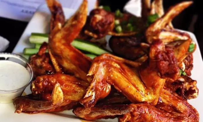 Pub Grub Meal for Two with Wings at Ray J's American Grill (44% Off). Two Locations.  - Primary Image