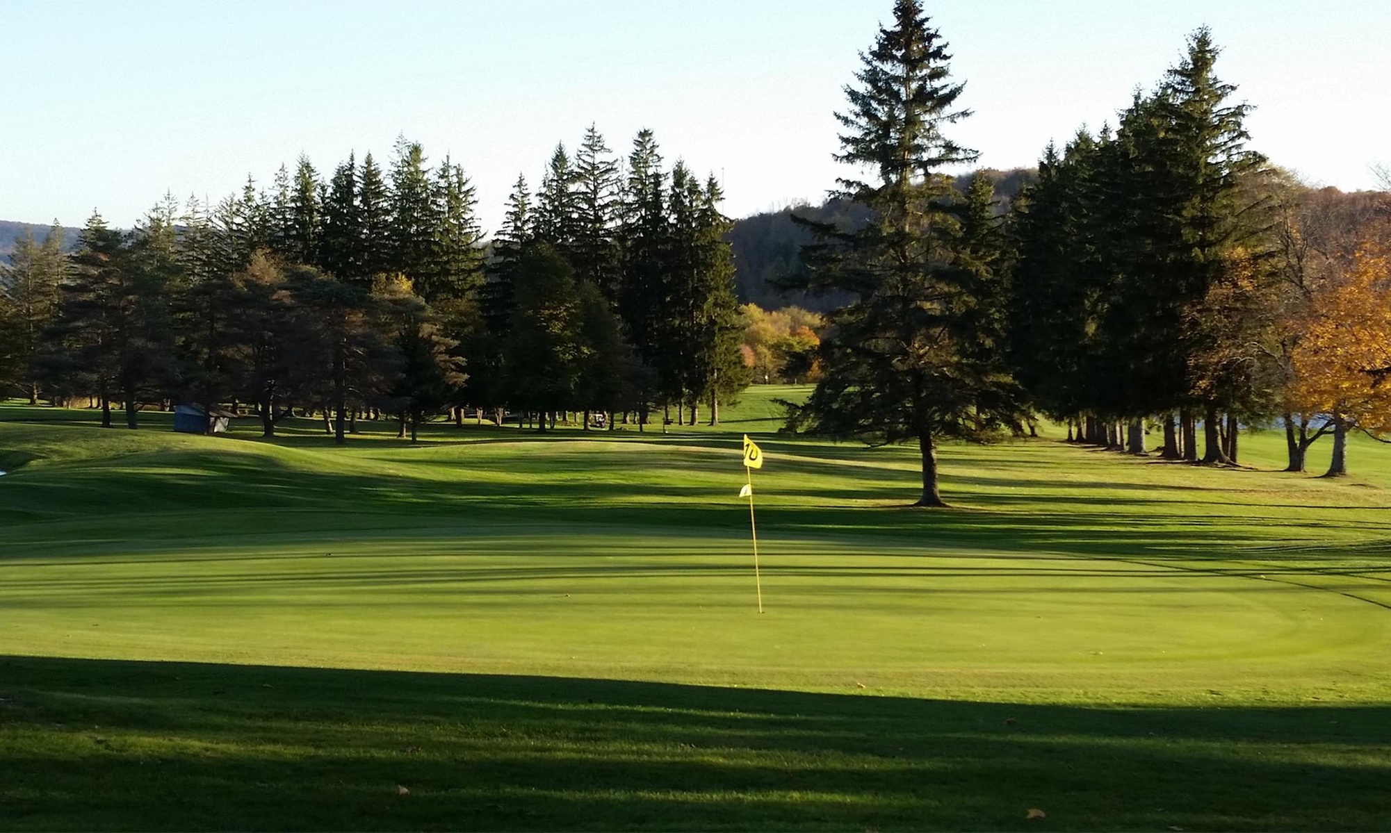 Tee Off with 9 or 18 Holes of Golf & Cart for One, Two, or Four People