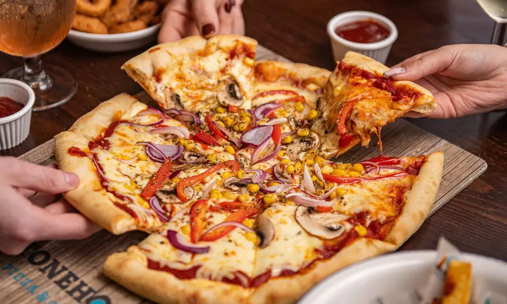 Stonehouse Pizza & Carvery 2 Course for 2 & Up to 2 children - (Up to 44% Off) - Primary Image