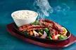 Let The Summer In with Fresh Skillets and Sizzling Starters from ⭑★ Sizzling Pub & Grill ★⭑, Nationwide - Second Medium