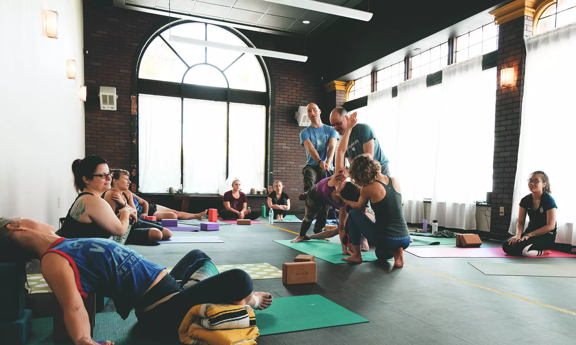 10 Hot or Regular Yoga Classes or Unlimited Yoga Classes for One Month at We Yoga Co. (Up to 61% Off) - Primary Image