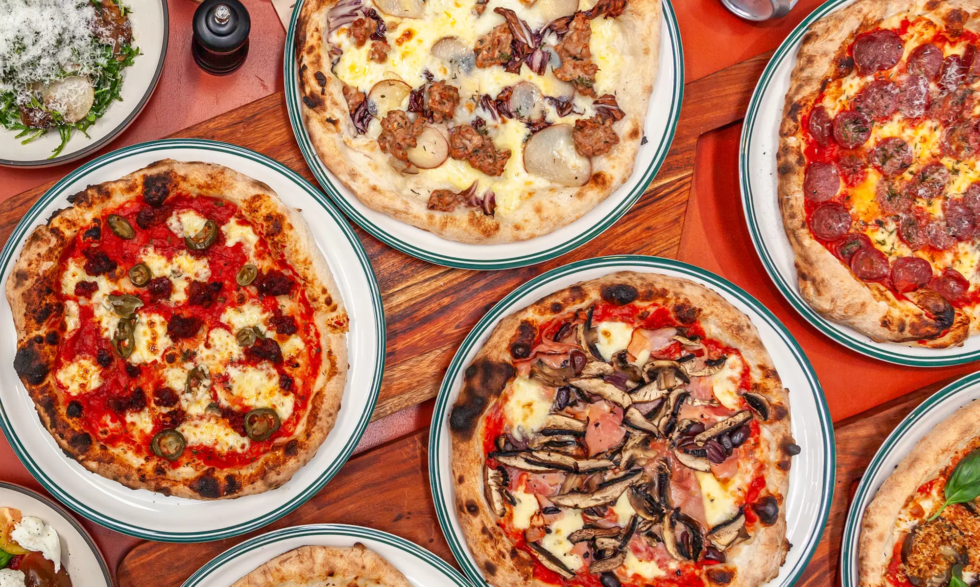 Enjoy a pizza and pint with sides for Two or Four at Local Brewing Co