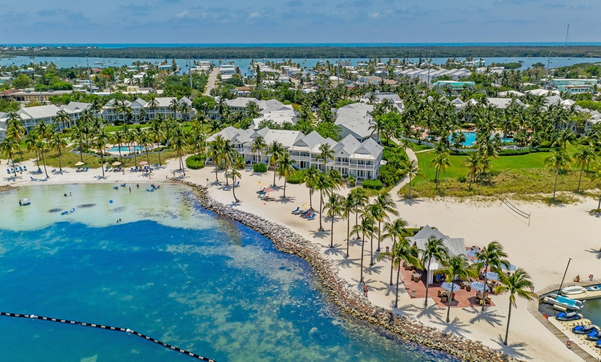 Image 1: 4-Star Beachfront Resort with Private Beach, Pools, and On-Site Dining