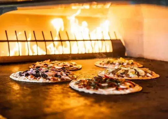 Up to 33% Off on Pizza Place at Caffe Ethos