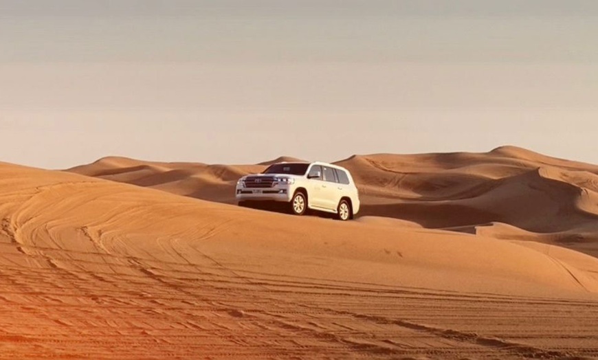 Image 1: Adventure Awaits with VIP Desert Safari and Quad Ride