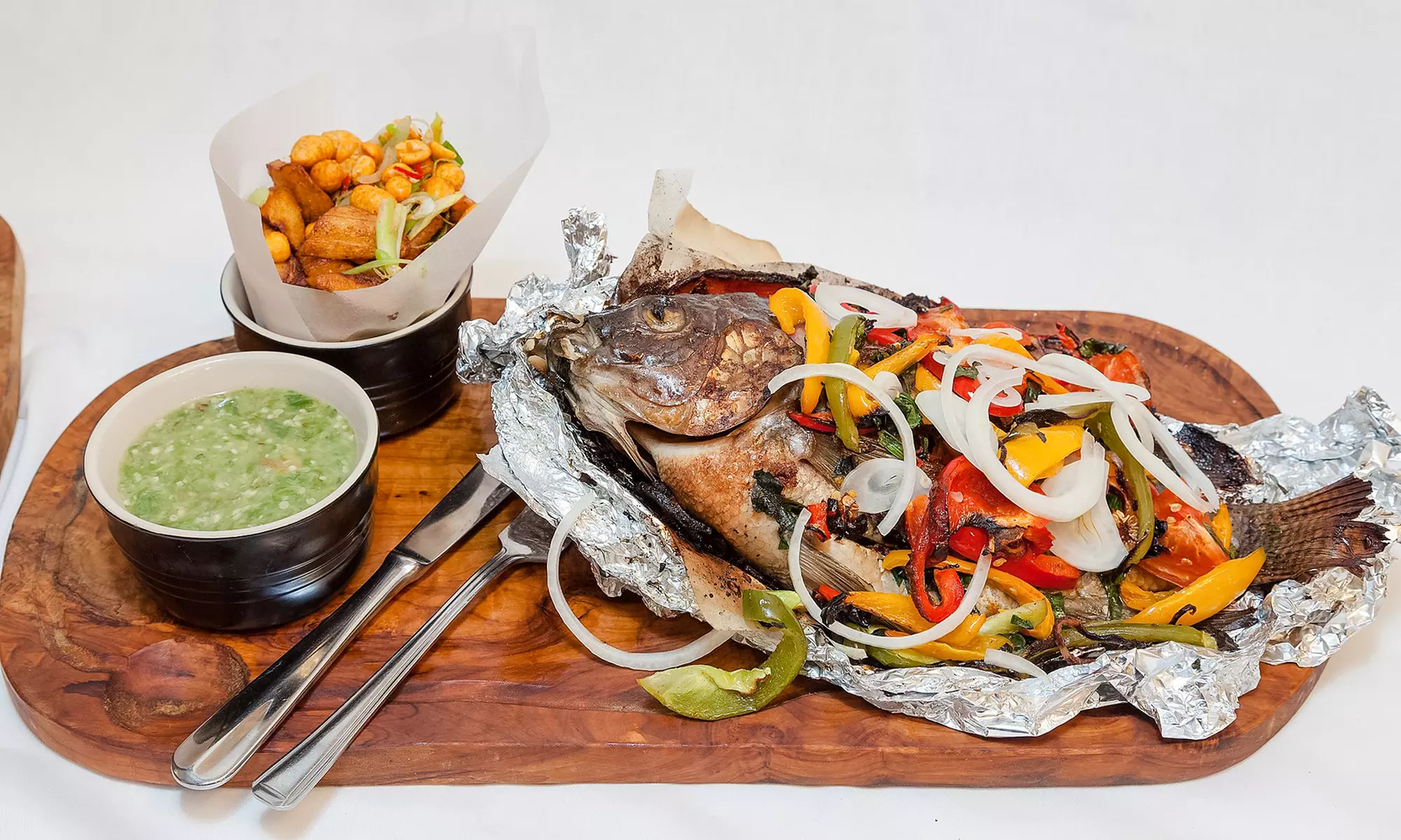 Two-Course Nigerian Meal with Cocktails for Two or Four at Leilani Restaurant & Ashanti Lounge Bar - Primary Image