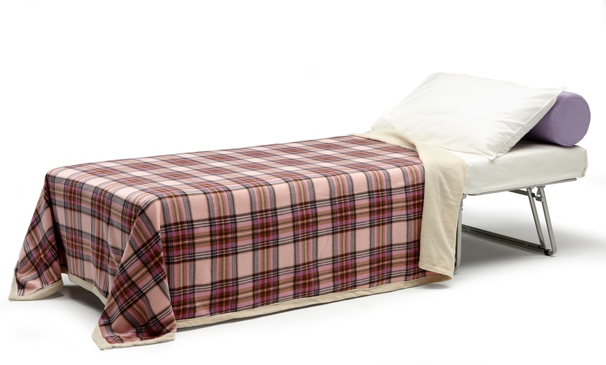 Image 3: Puf convertible en cama