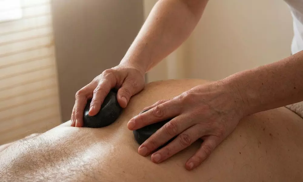 Indulge in 60-Min Swedish, Prenatal, Sports, Hot Stone, Deep Tissue, or Lymphatic Recovery,  Up to 53% Off