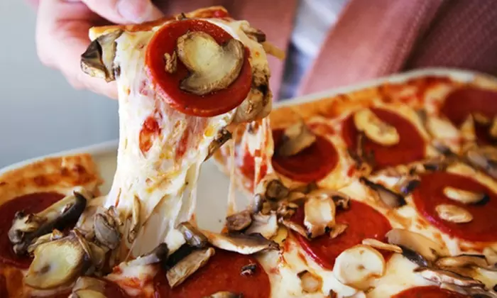 Enjoy a Delicious Dinner for Two or Four with Wine or Dining Credits at Ledo Pizza (Up to 43% Off) - Primary Image