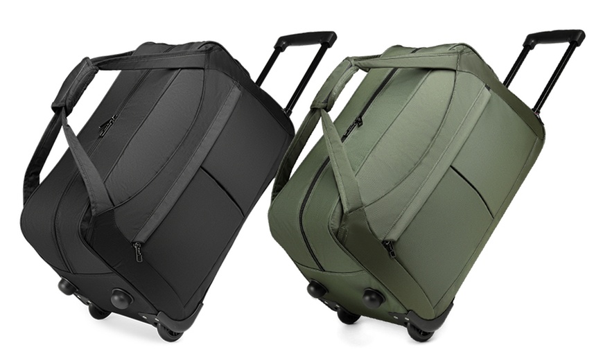 Image 1: Easy to Store Foldable Large Capacity Trolley Travel Bag