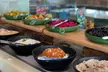 Lunch or Dinner Buffet with Soft or House Beverages for Child or Adult at Royal M Hotel by Gewan Abu Dhabi - Image 6