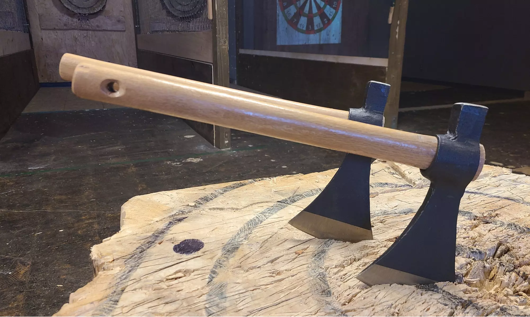 Join Woodsman Axe for a thrilling one-hour axe throwing experience, with options for two to four people and up to 23% off. - Second Medium