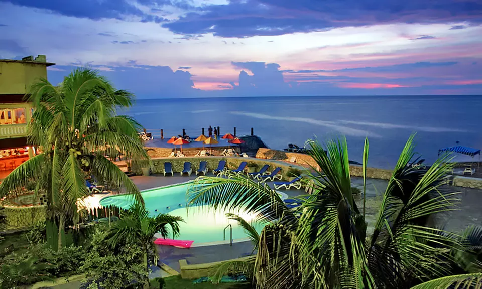 ✈ 4, 5, or 6 Night All-Inclusive Samsara Cliff Resort Stay w/ Air. Price per Person Based on Double Occupancy.    - Primary Image