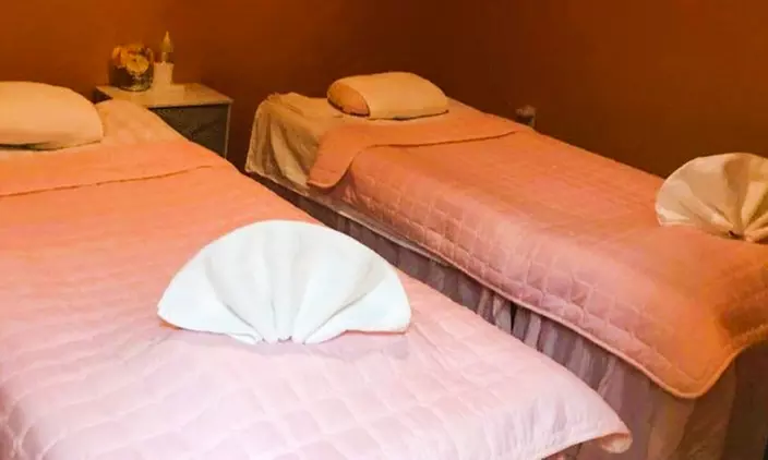 60 or 90-Min Deep Tissue Massage, Hot Stones, Aromatherapy & Foot Rub
