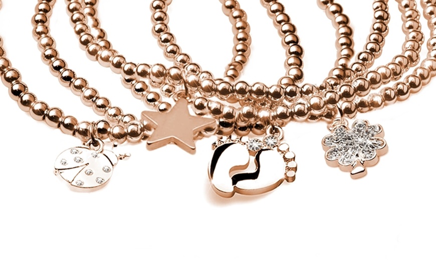 Image 1: Bracciale in acciaio con charm 