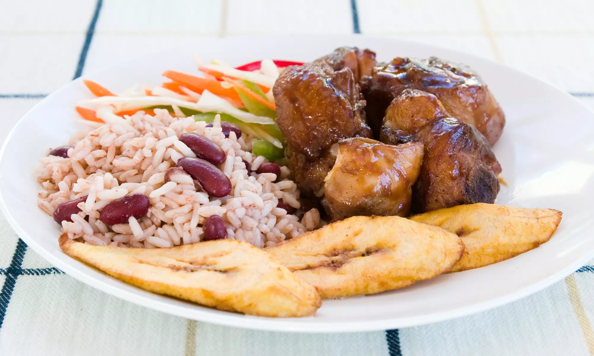 $12 for Two Small Reggaefest Chicken Combo Meals at Golden Krust Caribbean Bakery and Grill (Up to $25 Value) - Primary Image
