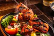 Sizzling Pub & Grill: Tuck In & Turn Up the Heat with delicious Starters & Skillets (Up to 35% Off) - Second Medium