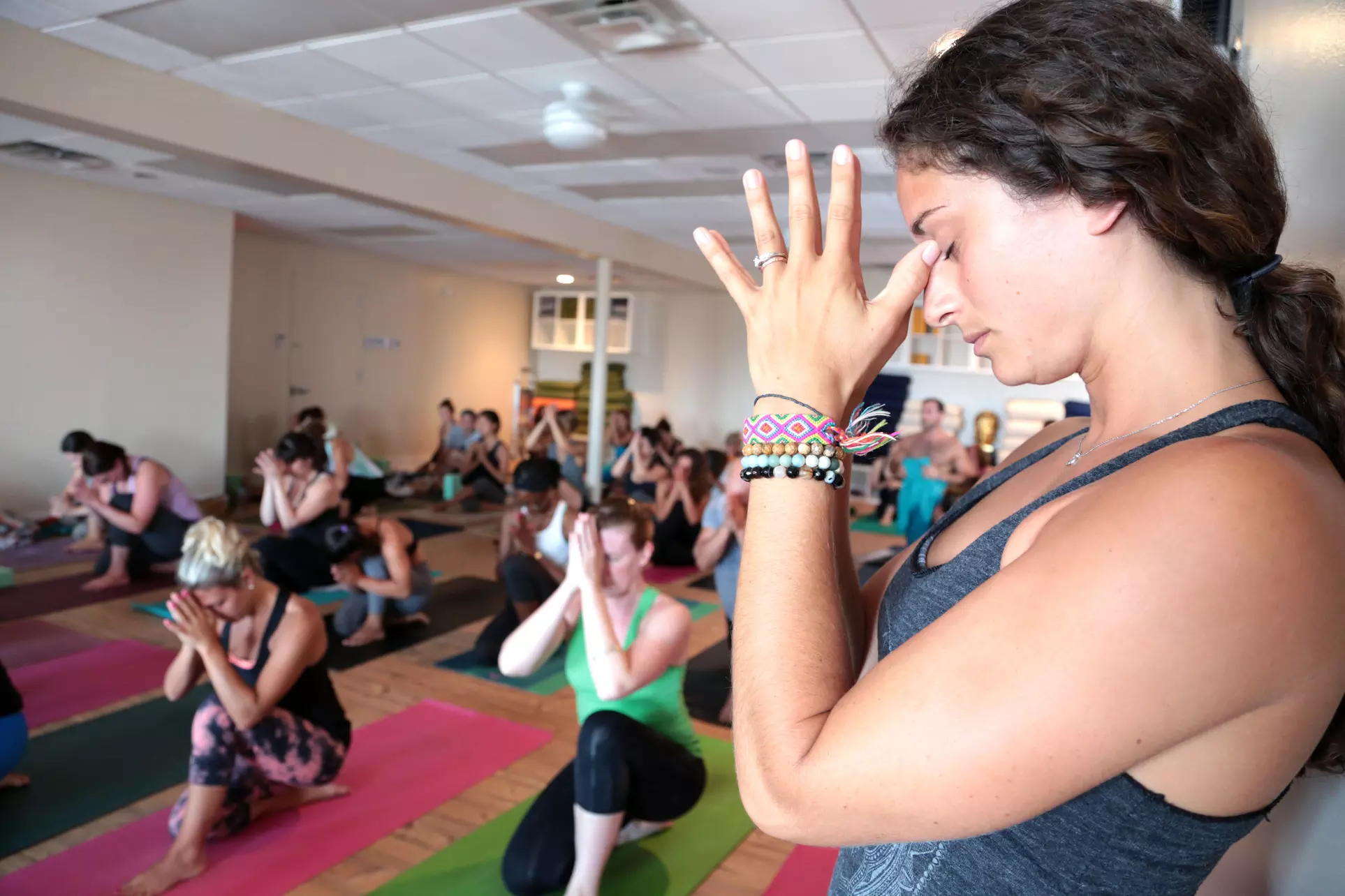 $59 for One Month of Unlimited Yoga at Yoga Nanda's Garden City or Long Beach Studio ($175 Value) - Primary Image