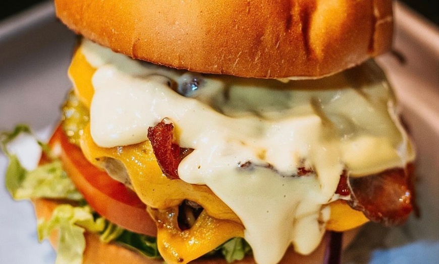 Image 1: (Up to 44% Off) on Hamburger, Fries & Drink at Mosh Burger