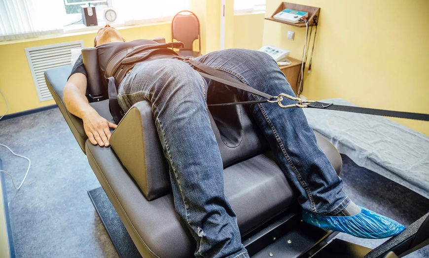 Image 1: Experience a Consultation w/ One or Two Spinal Decompression Treatment