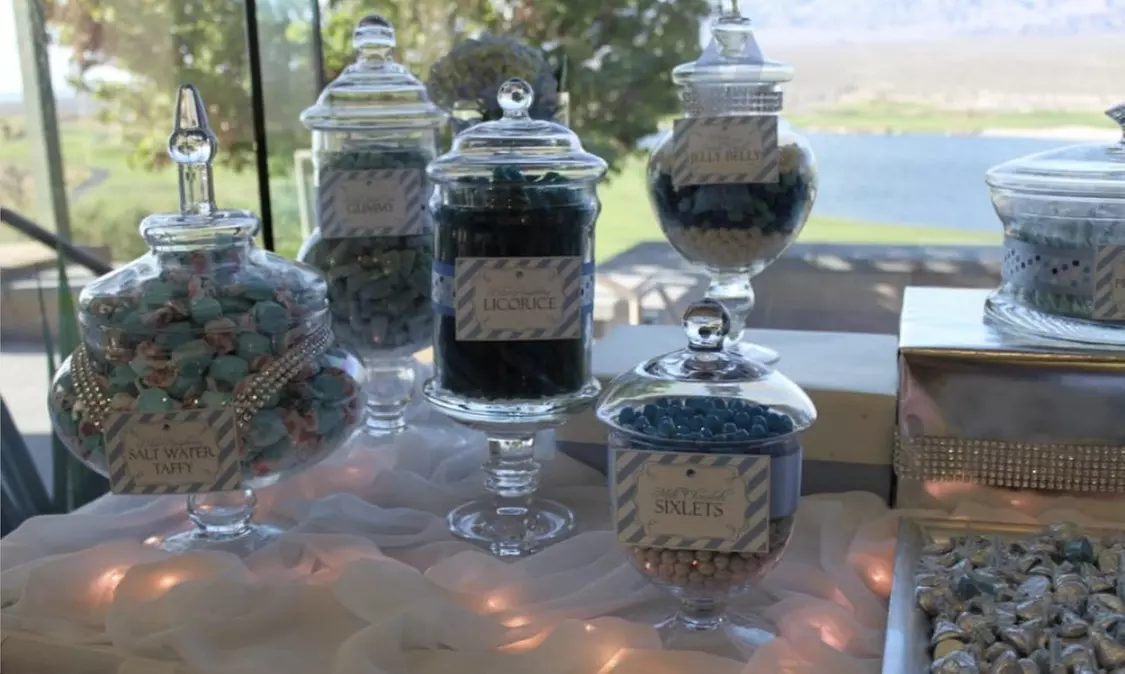 Enjoy Ella Events' Candy Table options, including deluxe backdrops, with up to 50% off for a sweet celebration. - Primary Image