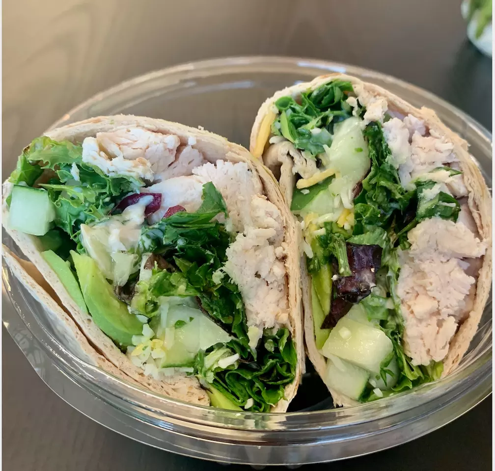 Enjoy a combo meal with wrap and smoothie at Kwench Juice Cafe, offering up to 39% off for a refreshing treat. - Second Medium