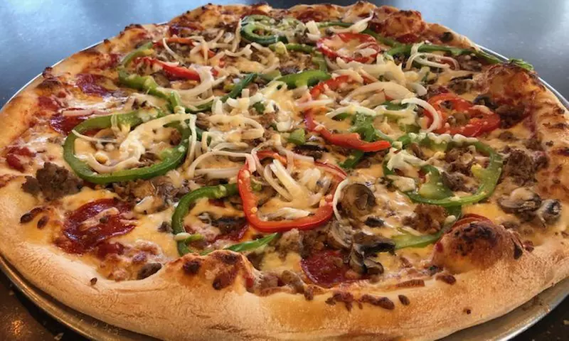 Pizza and More at Tomato Jake's Pizzeria (Up to 35% Off). Two Options Available. - Primary Image