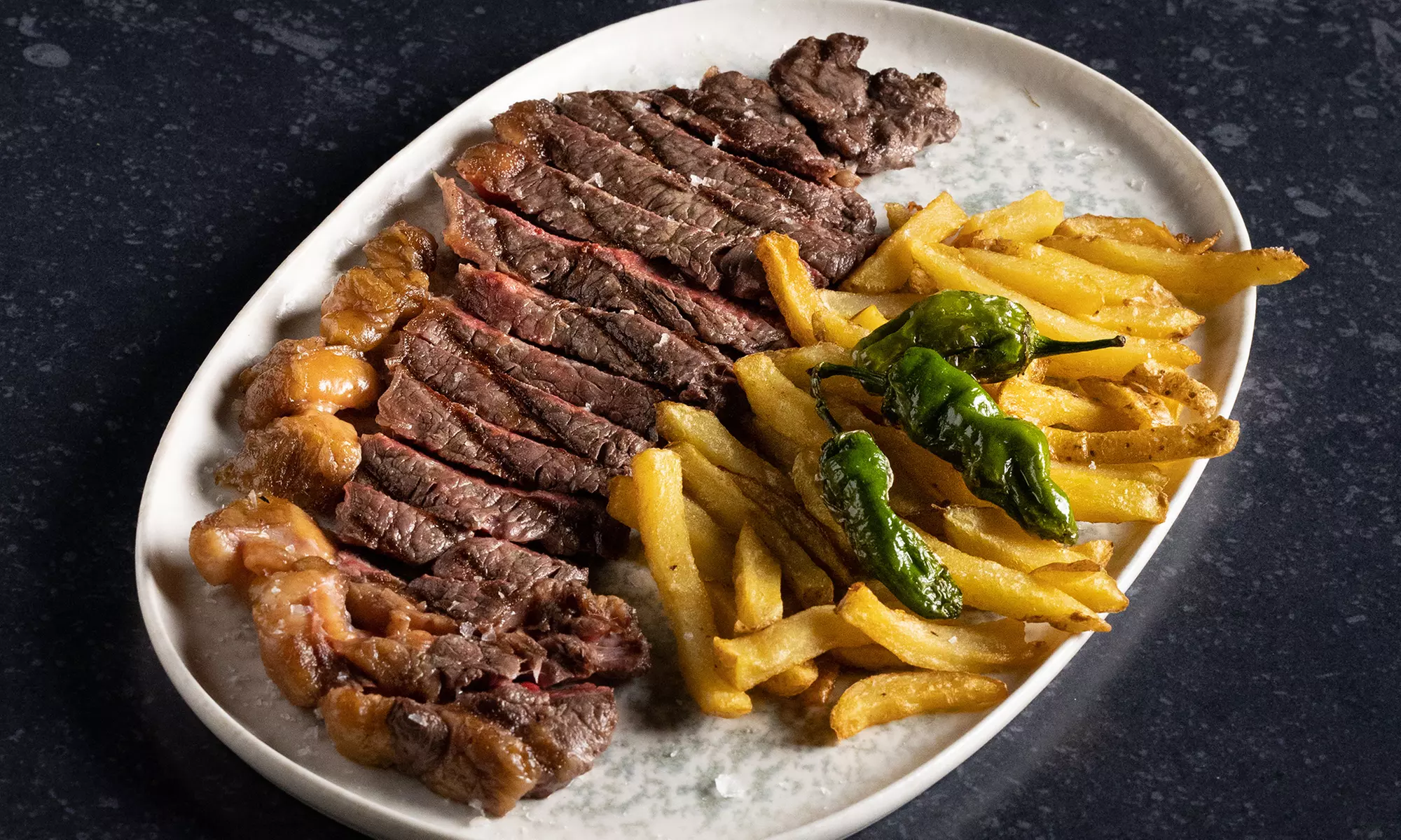 Menú de parrillada con entrante y bebida para 2 o 4 personas con hasta 35% de descuento - Primary Image