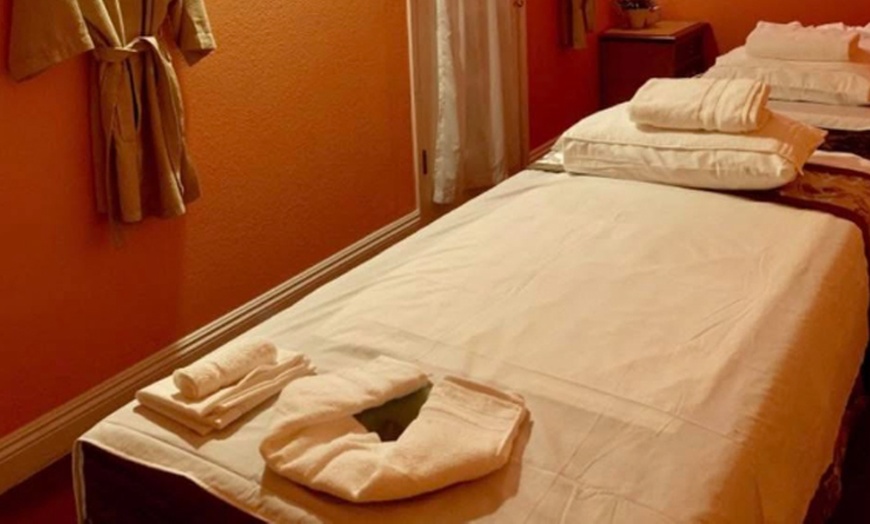 Image 1: 45, 60, or 90-Min Deep Tissue Massage w/ Body Scrub or CBD Relief Gel