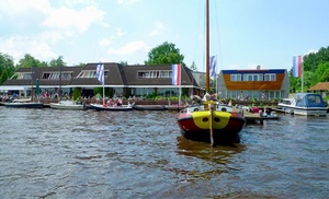 Aan het Friese water: standaard kamer met ontbijt, naar keuze diner