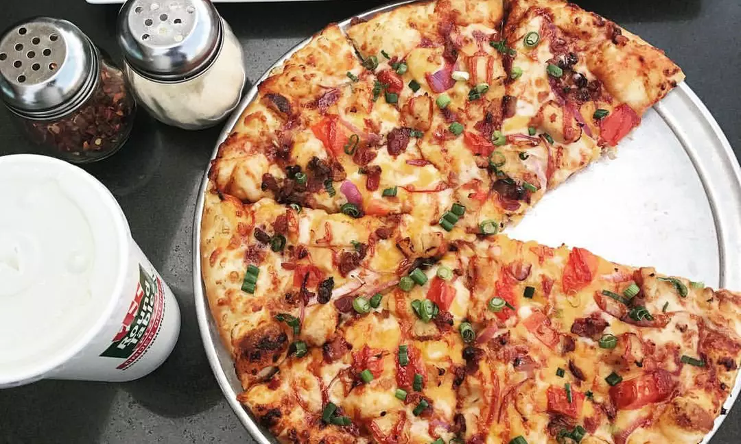 Pizza at Round Table Pizza (Up to 43% Off). Two Options Available. - Primary Image