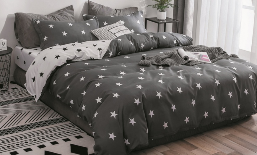 Image 1: Reversible Starry Night Duvet Set