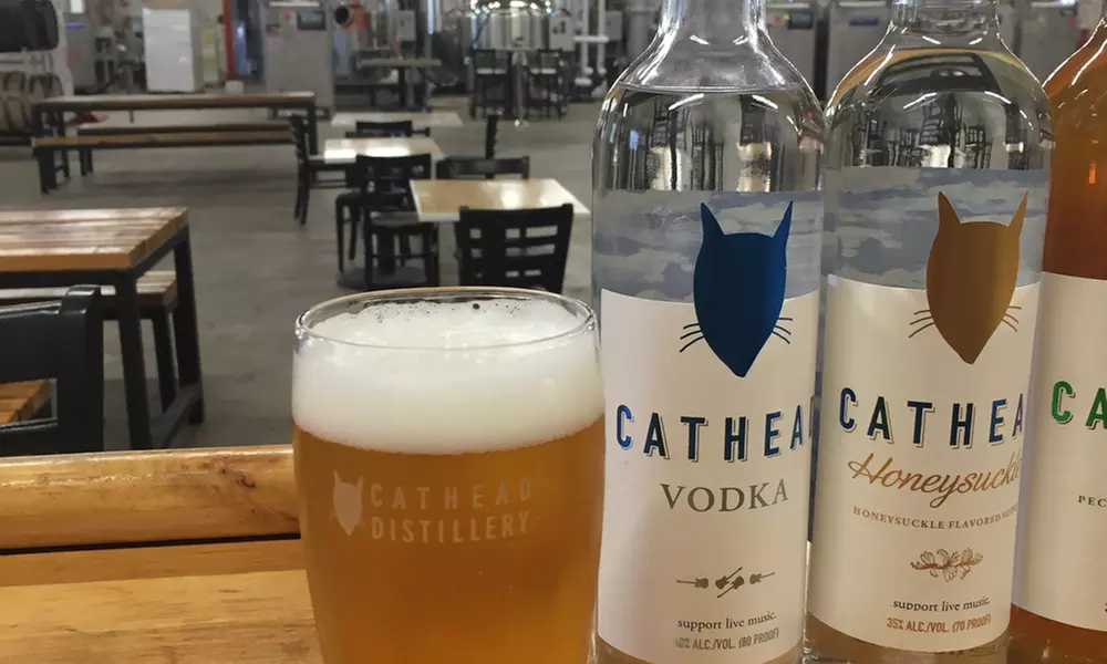 Tour with Tastings, a Shot Glass, and a Beer for 2, 4, or 10 at Cathead Distillery (Up to 61% Off) - Primary Image