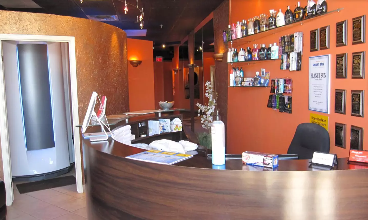 Spray Tanning Sessions or Four Sessions or One-Month Unlimited UV Tanning Sessions at Planet Sun (Up to 38% Off) - Second Medium