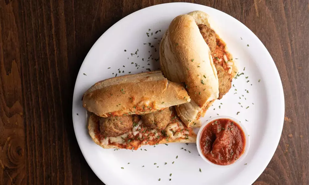 $25,$50, or $100 Spend on Food & Drinks or Choice of Pizza + Toppings