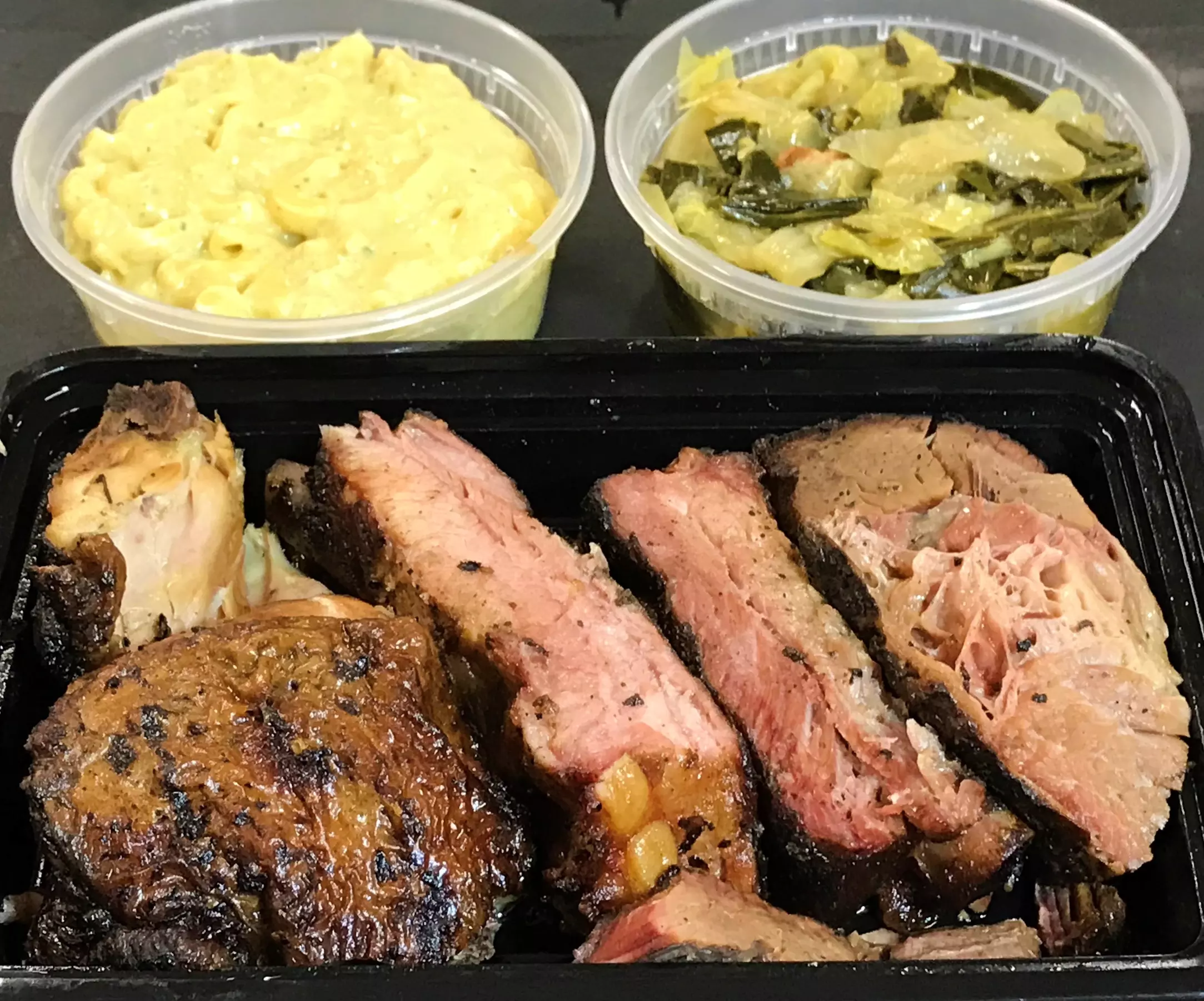 $14 for $20 Worth of  Food and Drink for Carryout at The Man BBQ Food Truck - Second Medium