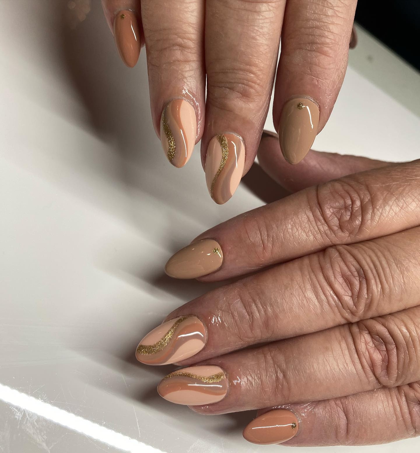 Gel Manicure and Spa Gel Pedi with Hot Stones Available Anytime
