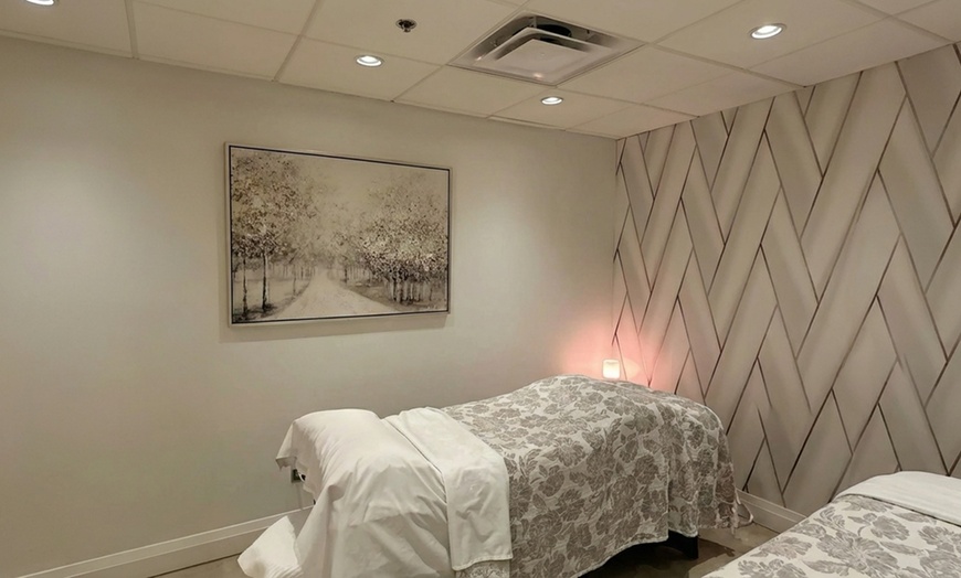 Image 2: Relax w/ One or Two 60 Min Swedish or Deep Tissue Massage + Hot Stones