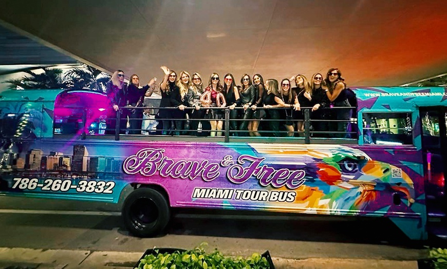 Image 3: Enjoy 1.5-Hours Open-Air Party Bus Tour with Guide & Iconic Views