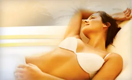 $50 for $120 Worth of Tanning or Custom Airbrush Tanning at Executive Tans - Primary Image
