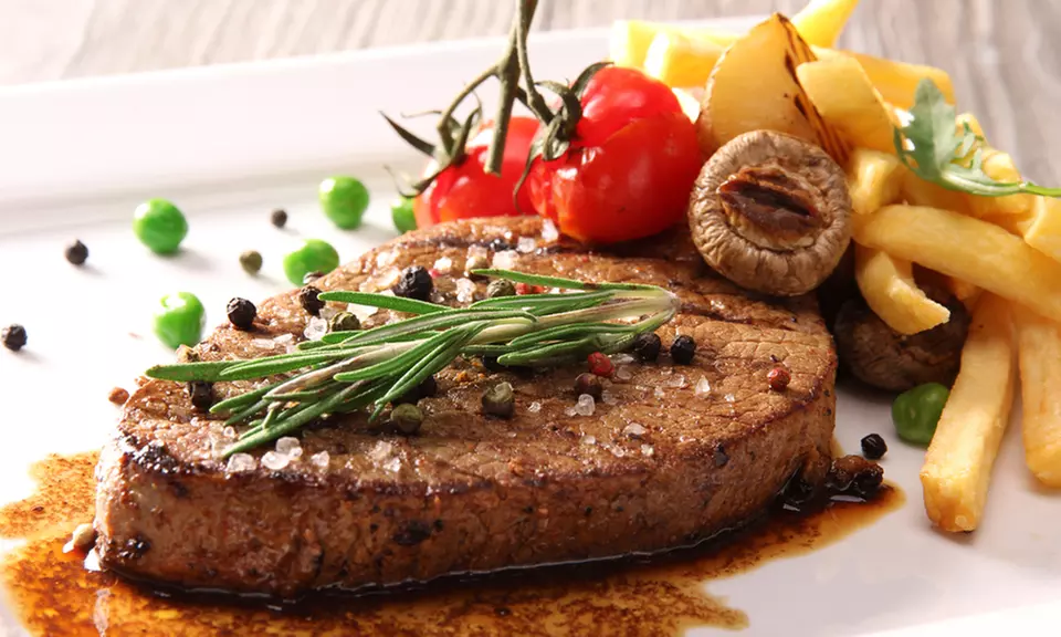 Rib-Eye Steak With Chips and Salad at Cactus Grill Bar Restaurant