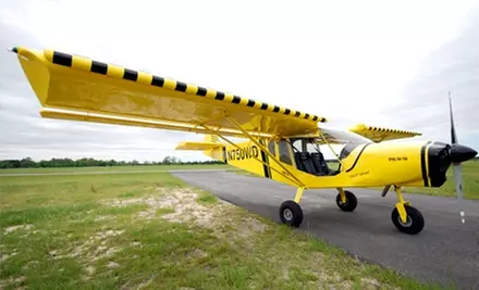 $99 for Intro Flight Lesson, Commemorative Photo, DVD, Simulator, and Logbook at Pilot Coach Aviation ($240.50 Value) - Primary Image