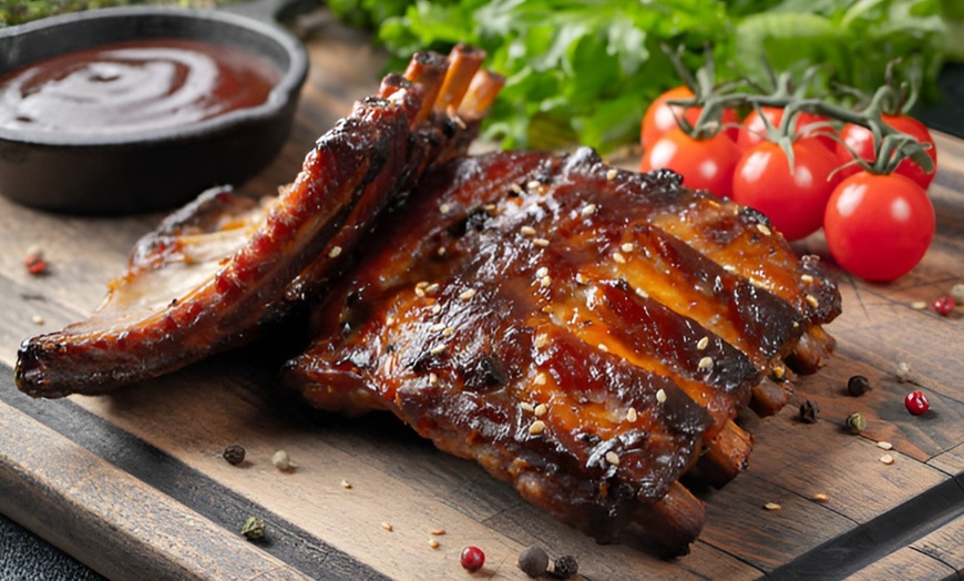 Image 1: Bon Bini! Caribische spareribs met saus, friet en drankje