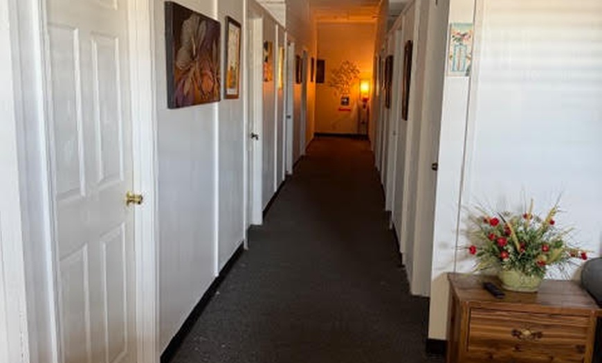 Image 8: Massages for 1 or 2 with Aromatherapy and Optional Hot Stones 