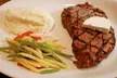 Savor Italian Cuisine with Dinner with Wine for Two or Four People, or $100 Dining Credit (Up To 26% Off) - Second Medium