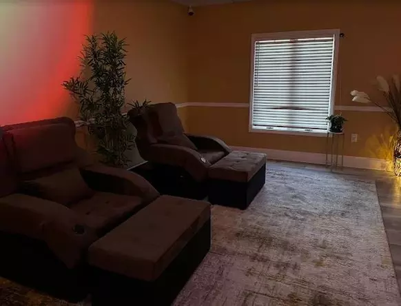 60-Minute Therapeutic Massage or Couples Massage with Hot Stones
