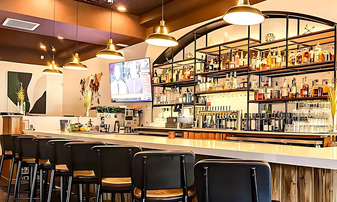 $25 or $55 Towards Food and Drink or Two Entrees and a Bottle of Wine