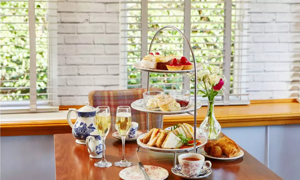 Delightful Afternoon Tea for 2 or 4 with Optional Bubbles at The Grange Manor (Up to 50% Off) - Primary Image