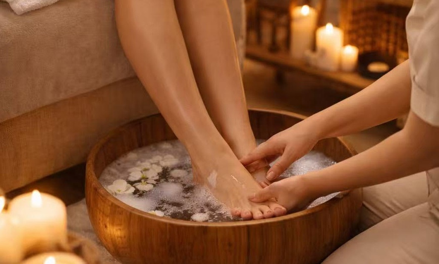 Image 4: 90-, or 120-Min Hotstone Massage, Foot Bath & Reflexology or Facials